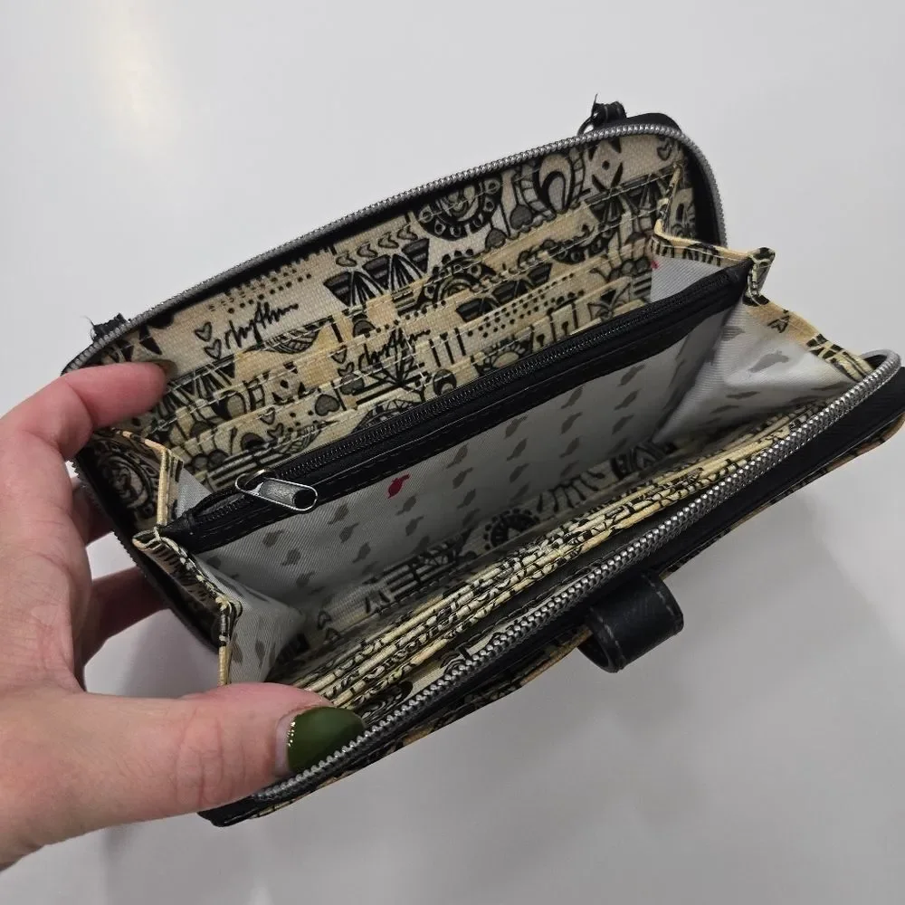 The Sak wallet clutch